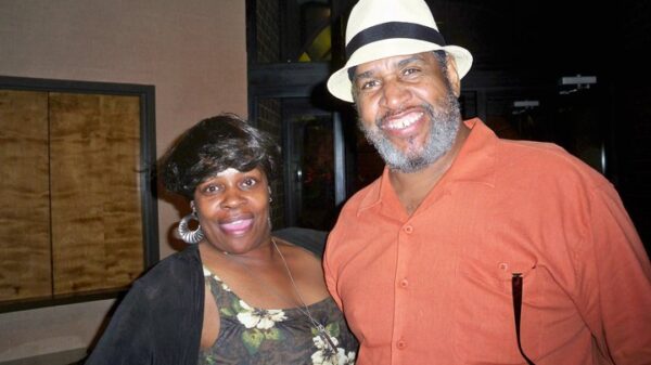 Eurie Stamps smiles with his wife Norma.