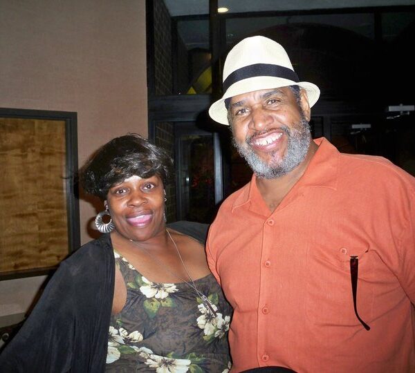 Eurie Stamps smiles with his wife Norma.
