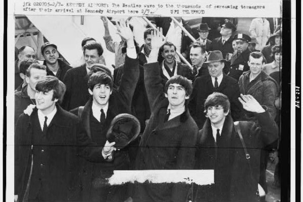 The Beatles enter Kennedy Airport February 1964