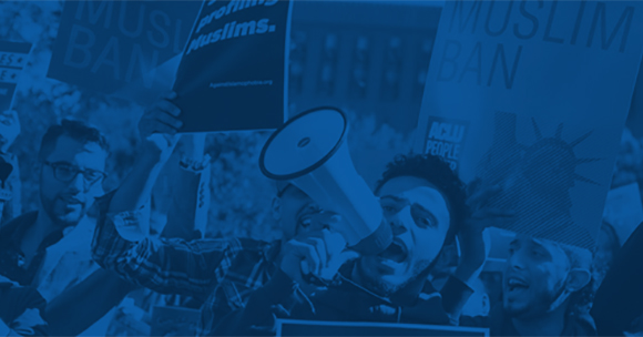 Blue overlay on photo of protestor with megaphone