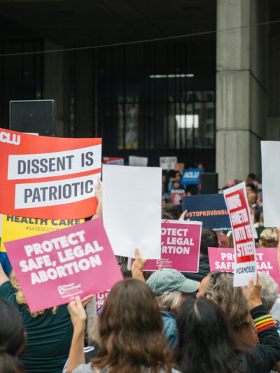 People rally outside Boston City Hall to oppose Judge Kavanaugh's nomination to the Supreme Court