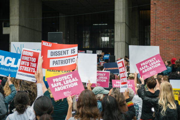 People rally outside Boston City Hall to oppose Judge Kavanaugh's nomination to the Supreme Court