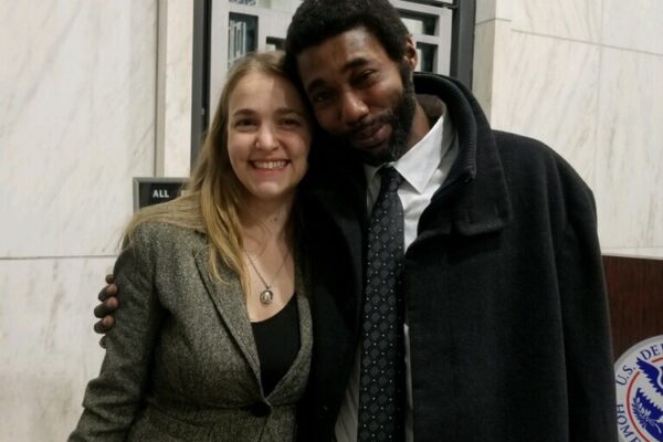 ACLU of Massachusetts staff attorney Adriana Lafaille and client Clayton Gordon outside courtroom