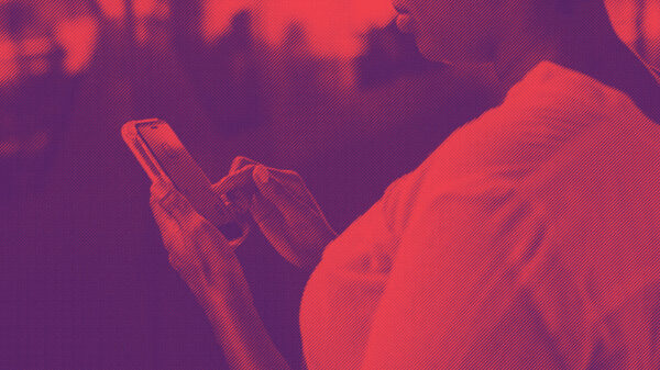 Woman holding cell phone