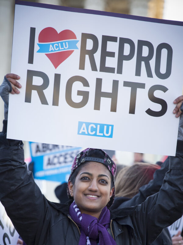 Protester holding "I Love Repro Rights" sign
