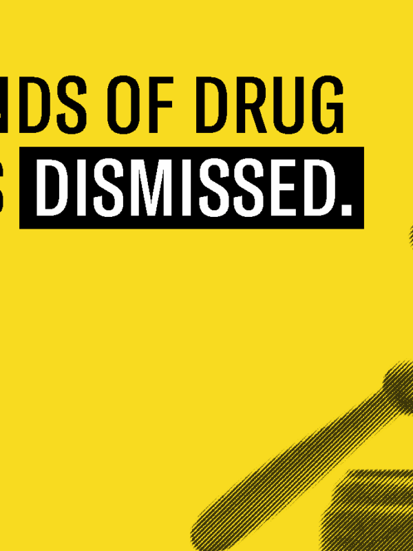 Yellow background and faded black gavel under text "Thousands of drug charges dismissed."