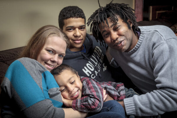 Clayton Gordon and family on couch