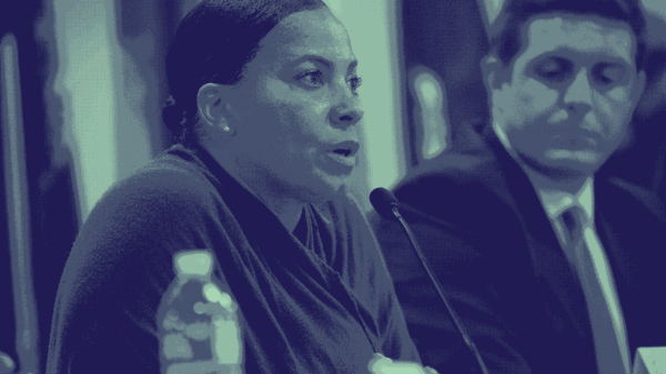 Rachael Rollins speaks at an ACLU-held DA candidate debate at the Suffolk House of Corrections in fall 2018.