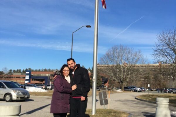 Lilian Calderon embraces her husband after being released from ICE detention