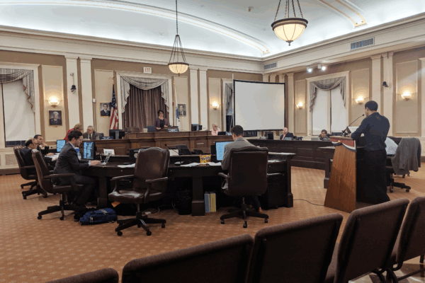 ACLU staff Emiliano Falcon testifies before the Somerville City Council in June 2019