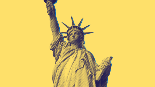 Yellow and blue statue of liberty against yellow background