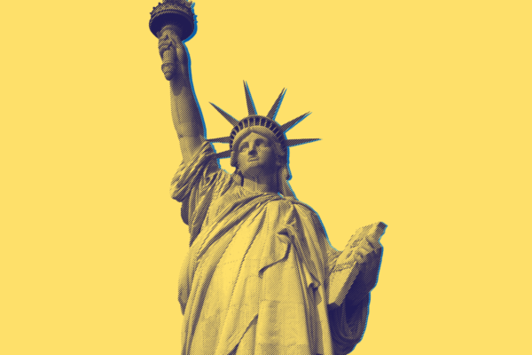 Yellow and blue statue of liberty against yellow background