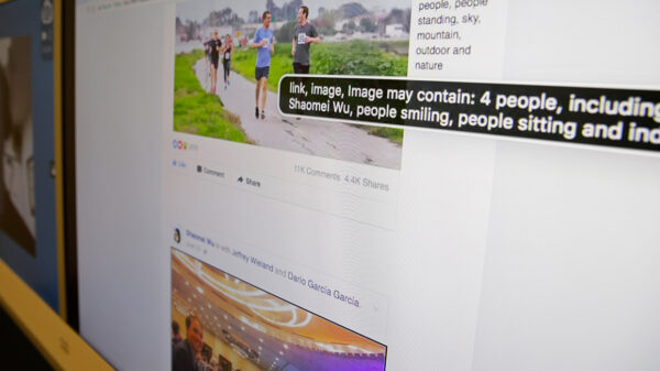 A screen displaying Facebook's facial recognition technology