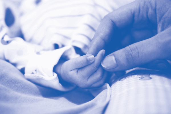 Parent holds baby's and