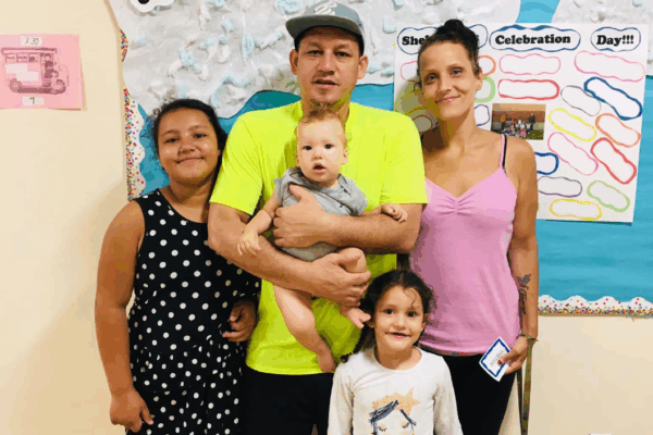 Gilberto Pereira Brito with his wife and three children after his release from ICE detention