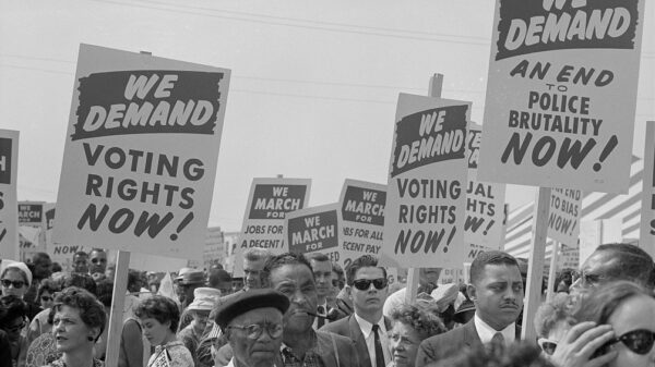 Marchers with signs at the March on Washington in 1963