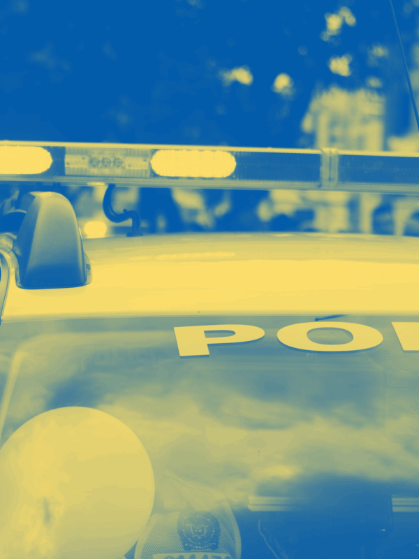 Blue and yellow color treatment on police car