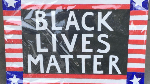 Black Lives Matter sign with patriotic flourishes