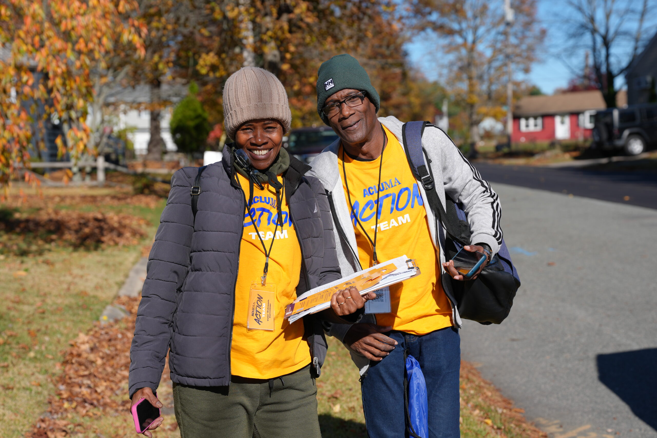 Two people smiling in beanie hats at Brockton BIPOC to theBallot Box.