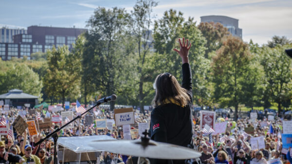 Carol Rose speaking to the crowd at the No Kings Protest in Boston Common