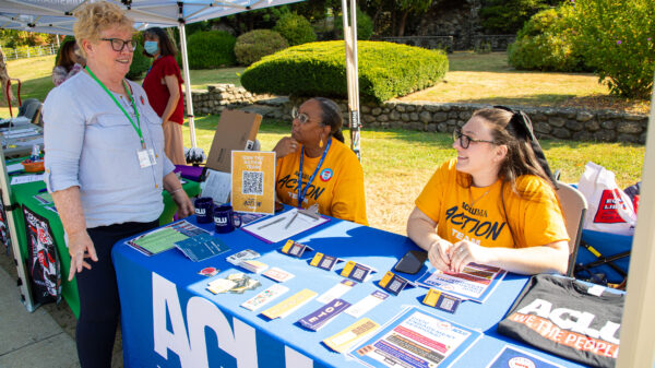 ACLU staff in community having conversation.