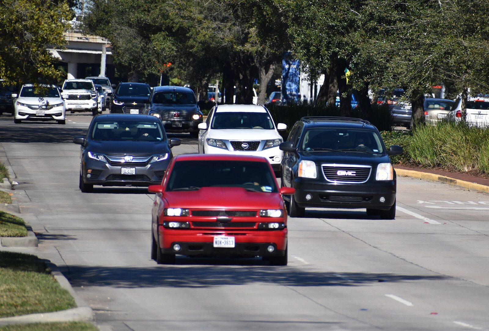 Cars driving down the road by ArtisticOperations