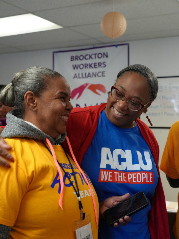 Traci Griffith greets a member of the ACLU Action Team