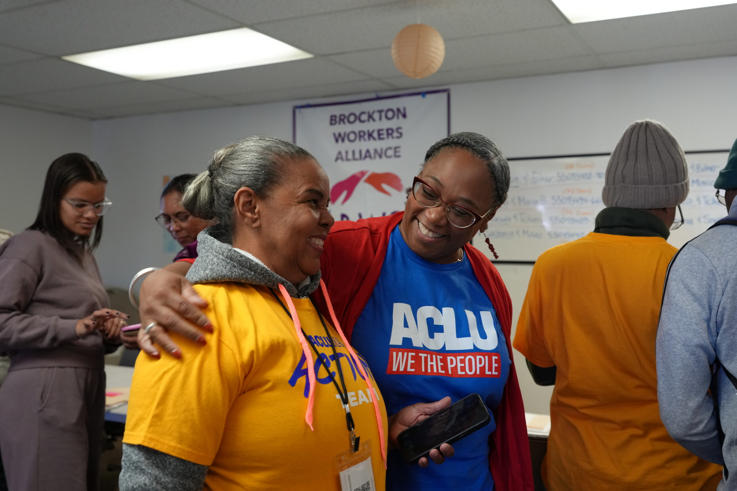 Traci Griffith greets a member of the ACLU Action Team