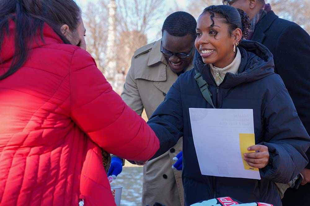 Rights and voting advocacy table at a festival