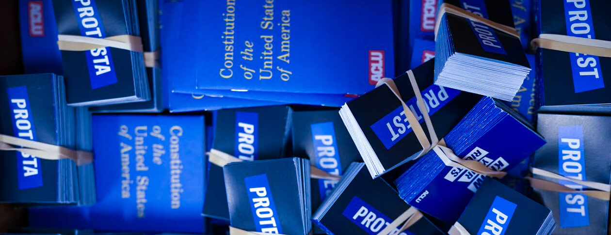 Resources packed and ready for community members including Know Your Rights cards, U. S. Constitution booklets in various languages.