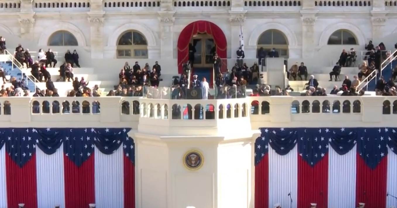 The Capitol building draped in American flags