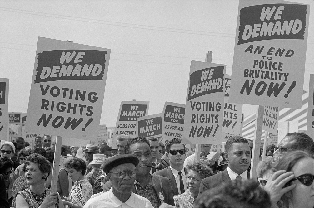 Marchers with signs at the March on Washington in 1963