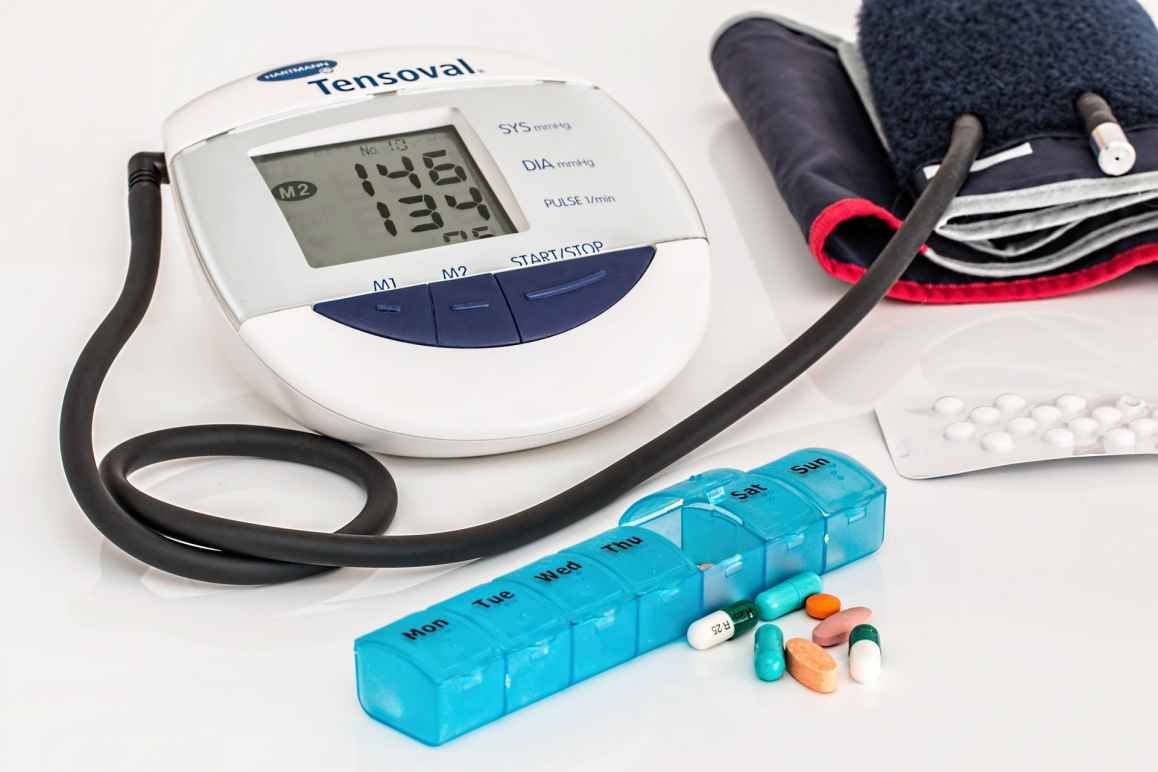 pills and blood pressure measurer