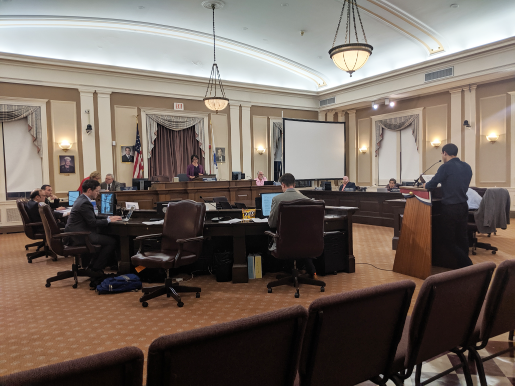 ACLU staff Emiliano Falcon testifies before the Somerville City Council in June 2019