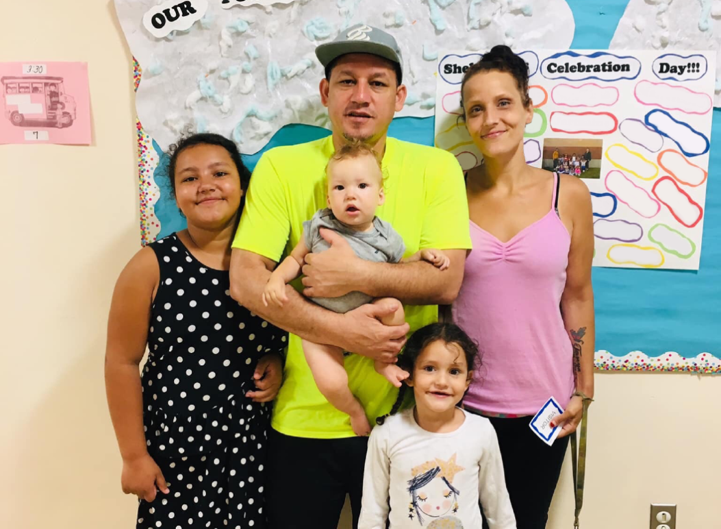 Gilberto Pereira Brito with his wife and three children after his release from ICE detention