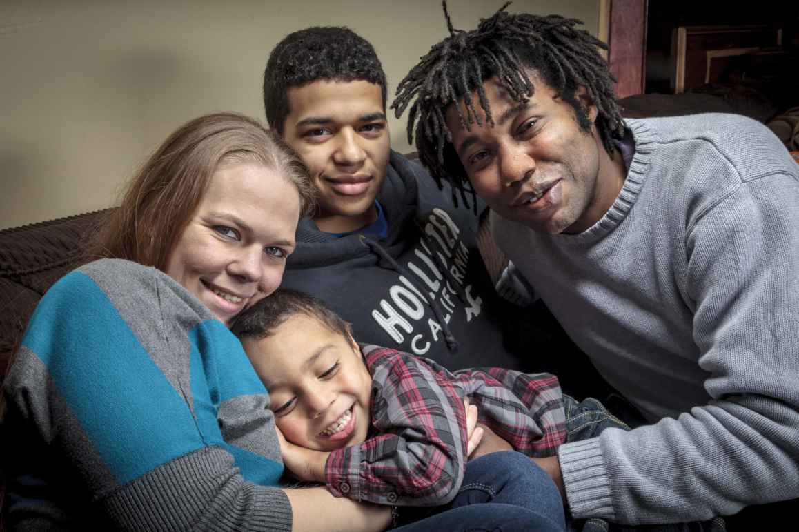 Clayton Gordon and family on couch