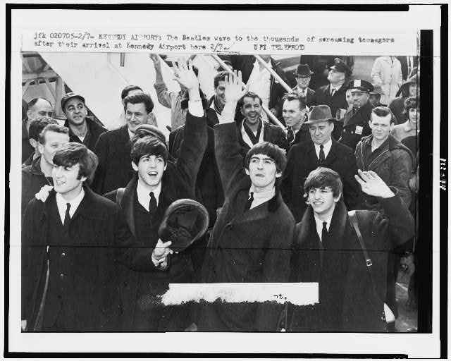 The Beatles enter Kennedy Airport February 1964