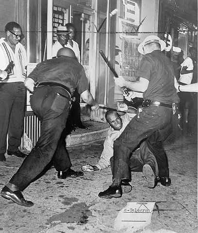 Incident at 133rd Street and Seventh Avenue during the Harlem Riots of 1964, photographed by a staff photographer of the New York World Telegraph & Sun.