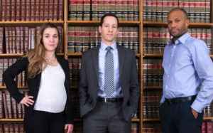 ACLU of Massachusetts team that has fought for justice for thousands of people who were convicted by tainted evidence in the Annie Dookhan drug lab scandal: Adriana Lafaille, staff attorney; Matt Segal, legal director; Carl Williams, staff attorney
