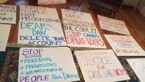 Posters calling for an end to the war on drugs in Massachusetts. Photo by Carl Williams.
